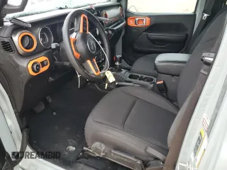 2023 Jeep Wrangler Willys with VIN 1C4HJXDN6PW664826, listed as a Copart auction lot 43116525 with 20,004 mi miles and Salvage Title. Bid and sale history available at DreamBid. Image 7.