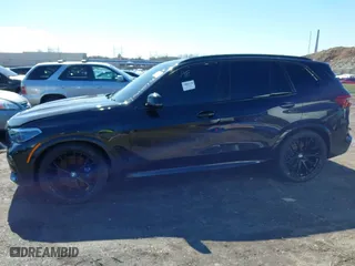 2019 BMW X5 xDrive50i with VIN 5UXJU2C5XKLN66873, listed as a IAAI auction lot 41472246 with 98,571 mi miles. Bid and sale history available at carsss.com. Image 13.