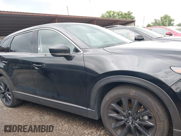 2023 Mazda CX-9 Touring Plus with VIN JM3TCBAY2P0657825, listed as a IAAI auction lot 42756562 with 52,090 mi miles and . Bid and sale history available at DreamBid. Image 13.