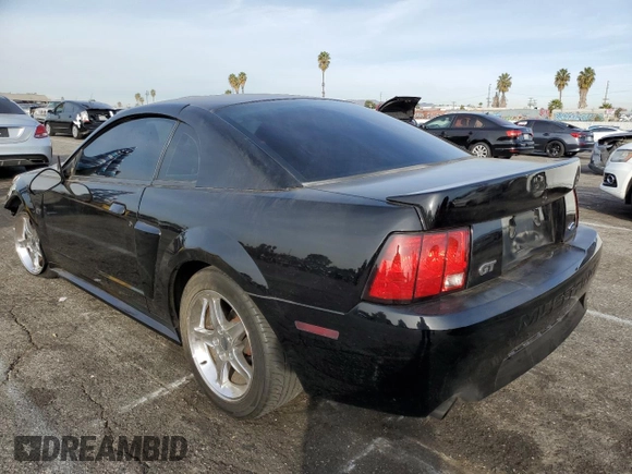 2001 Ford Mustang GT Deluxe with VIN 1FAFP42X71F163143, listed as a Copart auction lot 81133184 with 132,716 mi miles and Salvage Title. Bid and sale history available at carsss.com. Image 2.