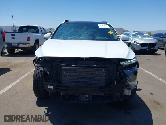 2020 Hyundai Santa Fe Limited with VIN 5NMS5CAD8LH209374, listed as a IAAI auction lot 42212130 with 32,378 mi miles and . Bid and sale history available at DreamBid. Image 13.