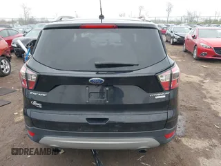 2017 Ford Escape Titanium with VIN 1FMCU0J95HUD37858, listed as a IAAI auction lot 41984629 with 87,163 mi miles and . Bid and sale history available at DreamBid. Image 15.