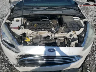 2016 Ford Focus Titanium z VIN 1FADP3J25GL201003, wystawiony jako Copart lot #53799745 z przebiegiem 194 055 mil mil oraz Szkoda całkowita • Salvage title. Historia ofert i sprzedaży dostępna na DreamBid. Obrazek 11.