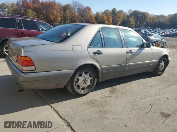 1995 Mercedes-Benz S 320 with VIN WDBGA32E6SA256435, listed as a Copart auction lot 77104234 with 309,498 mi miles and Clean Title. Bid and sale history available at DreamBid. Image 3.