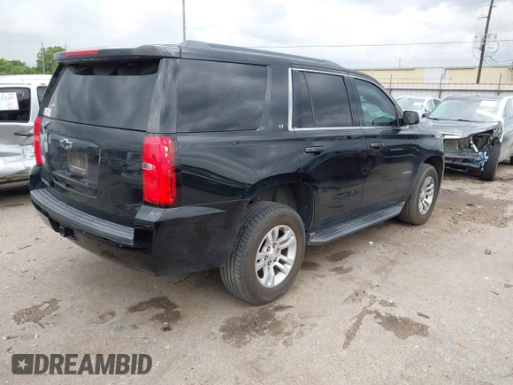 2016 Chevrolet Tahoe LT with VIN 1GNSCBKC1GR137030, listed as a IAAI auction lot 42180664 with 169,493 mi miles and . Bid and sale history available at DreamBid. Image 4.