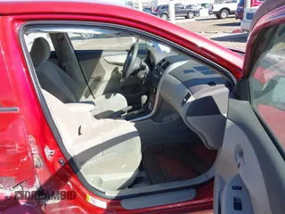 2009 Toyota Corolla with VIN JTDBL40E29J017537, listed as a IAAI auction lot 41757305 with 154,170 mi miles. Bid and sale history available at carsss.com. Image 5.