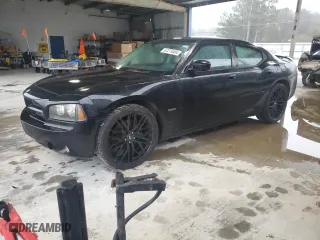 2010 Dodge Charger R/T with VIN 2B3CA5CT9AH156470, listed as a Copart auction lot 87279304 with 206,789 mi miles and Salvage Title. Bid and sale history available at carsss.com. Image 1.