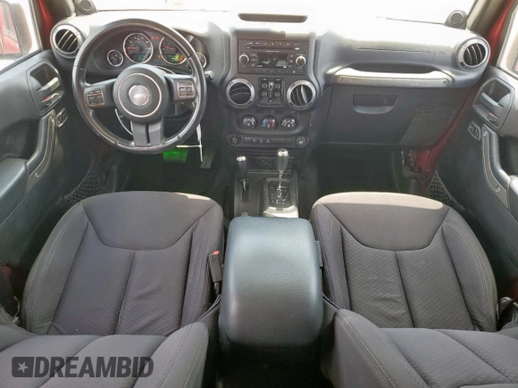 2013 Jeep Wrangler Unlimited Sport z VIN 1C4BJWDGXDL606491, wystawiony jako Copart lot #56065425 z przebiegiem 168 709 mil mil oraz Szkoda całkowita • Salvage title. Historia ofert i sprzedaży dostępna na DreamBid. Obrazek 8.