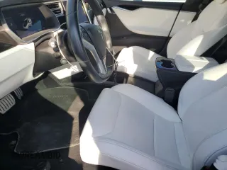 2016 Tesla Model S 90D with VIN 5YJSA1E49GF159988, listed as a Copart auction lot 76457024 with Not Provided miles and Salvage Title. Bid and sale history available at DreamBid. Image 7.