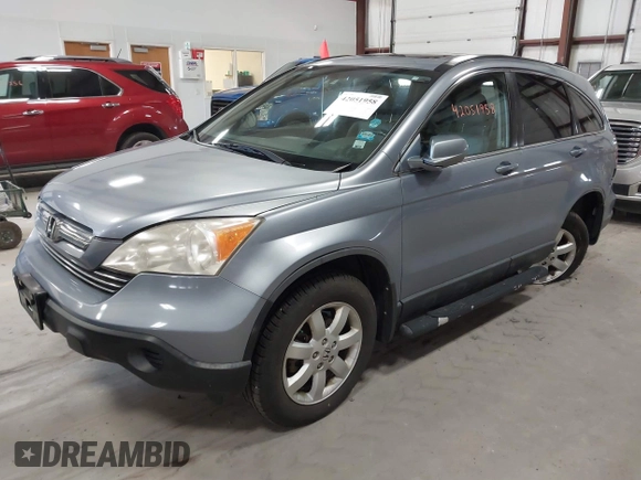 2007 Honda CR-V EX-L with VIN JHLRE48727C041503, listed as a IAAI auction lot 42051958 with 146,533 mi miles and . Bid and sale history available at carsss.com. Image 2.