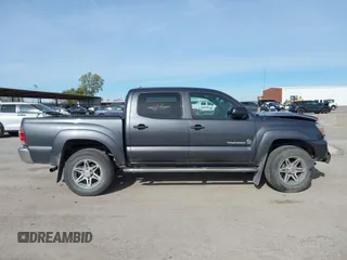 2014 Toyota Tacoma PreRunner with VIN 3TMJU4GN1EM156845, listed as a IAAI auction lot 40972570 with 65,138 mi miles. Bid and sale history available at carsss.com. Image 13.