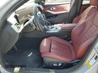 2023 BMW 3 Series 330i with VIN 3MW69FF00P8D52700, listed as a Copart auction lot 61629485 with 12,007 mi miles and Salvage title. Bid and sale history available at DreamBid. Image 7.