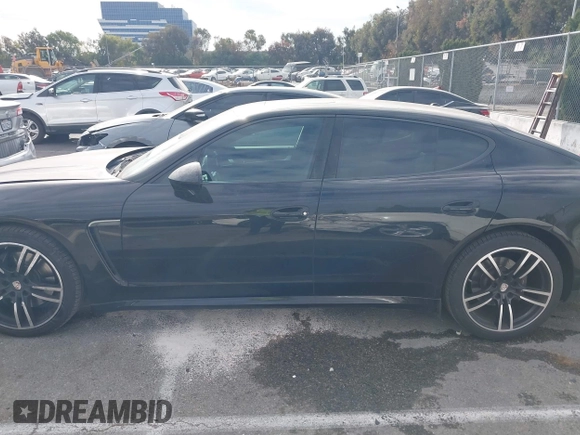 2015 Porsche Panamera 4 с VIN WP0AA2A75FL003203, выставлен на аукционе IAAI как лот 41080482 с пробегом 91 124 миль миль и . История ставок и продаж доступна на DreamBid. Изображение 15.