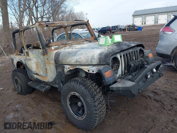 2003 Jeep Wrangler Sport with VIN 1J4FA49S93P374406, listed as a IAAI auction lot 41648982 with Not provided miles and . Bid and sale history available at DreamBid. Image 12.