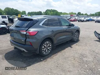 2020 Ford Escape Titanium with VIN 1FMCU9J94LUB19570, listed as a IAAI auction lot 42134031 with 110,248 mi miles and . Bid and sale history available at DreamBid. Image 4.