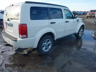 2008 Dodge Nitro SLT with VIN 1D8GT58K68W288772, listed as a IAAI auction lot 41621789 with 187,410 mi miles. Bid and sale history available at carsss.com. Image 4.