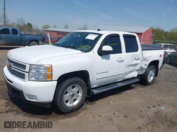 2013 Chevrolet Silverado 1500 LTZ with VIN 3GCPKTE24DG123063, listed as a IAAI auction lot 42061675 with 221,813 mi miles and . Bid and sale history available at DreamBid. Image 18.