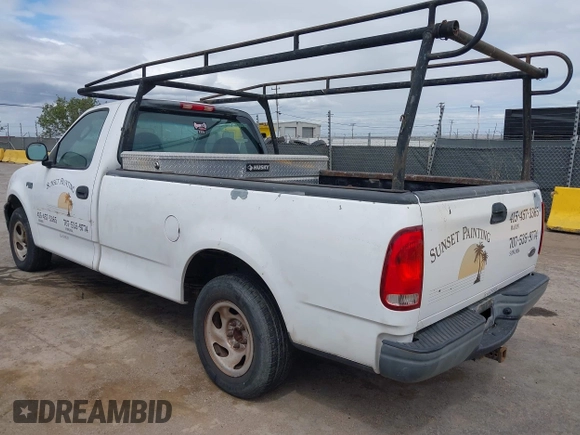2002 Ford F-150 XL with VIN 1FTRF172X2KE34789, listed as a IAAI auction lot 42138397 with 188,960 mi miles and . Bid and sale history available at DreamBid. Image 3.