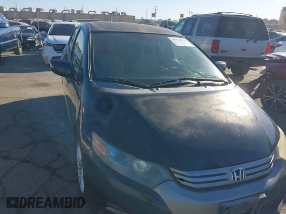 2010 Honda Insight EX with VIN JHMZE2H74AS012517, listed as a IAAI auction lot 41886588 with 227,428 mi miles and . Bid and sale history available at DreamBid. Image 6.