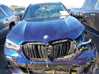 2020 BMW X5 M50i with VIN 5UXJU4C03LL227857, listed as a IAAI auction lot 41351112 with 65,325 mi miles and . Bid and sale history available at DreamBid. Image 13.