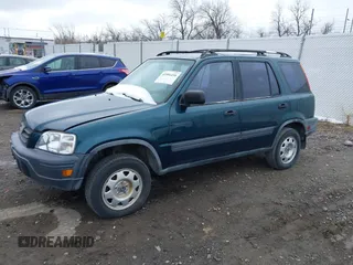 1998 Honda CR-V LX with VIN JHLRD2843WC011969, listed as a IAAI auction lot 41906450 with 210,854 mi miles. Bid and sale history available at carsss.com. Image 2.