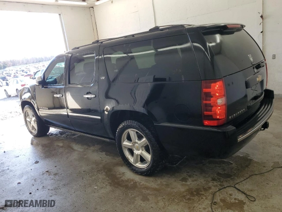 2011 Chevrolet Suburban LTZ with VIN 1GNSKKE38BR289541, listed as a Copart auction lot 44610195 with 228,762 mi miles and Salvage Title. Bid and sale history available at carsss.com. Image 2.