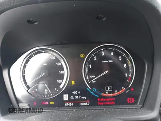 2022 BMW X1 xDrive28i z VIN WBXJG9C0XN5U89973, wystawiony jako IAAI lot #41508343 z przebiegiem 67 424 mil mil oraz . Historia ofert i sprzedaży dostępna na DreamBid. Obrazek 7.