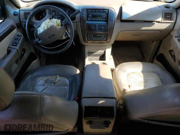 2003 Ford Explorer z VIN 1FMDU84W83ZA36002, wystawiony jako Copart lot #74583784 z przebiegiem 166 977 mil mil oraz Szkoda całkowita • Salvage title. Historia ofert i sprzedaży dostępna na DreamBid. Obrazek 8.