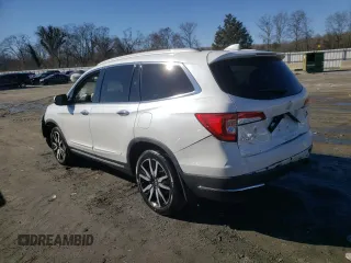 2021 Honda Pilot Touring 8-Passenger with VIN 5FNYF5H94MB001855, listed as a Copart auction lot 87891185 with 55,097 mi miles and Salvage Title. Bid and sale history available at DreamBid. Image 2.