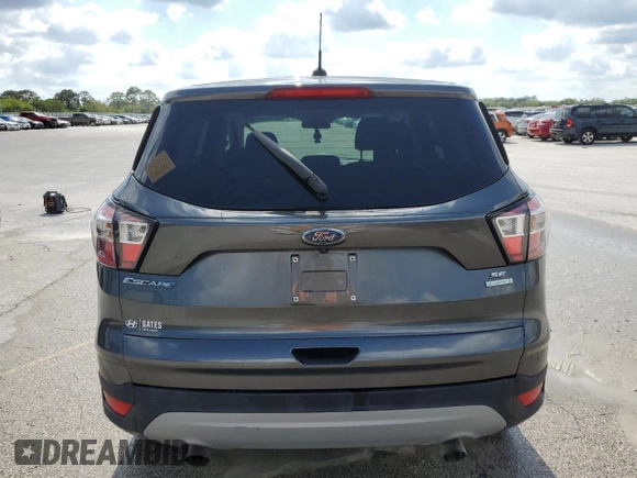 2017 Ford Escape SE z VIN 1FMCU0GDXHUE91333, wystawiony jako Copart lot #44536055 z przebiegiem Nie podano mil oraz Nie do naprawy • Non repairable. Historia ofert i sprzedaży dostępna na DreamBid. Obrazek 6.