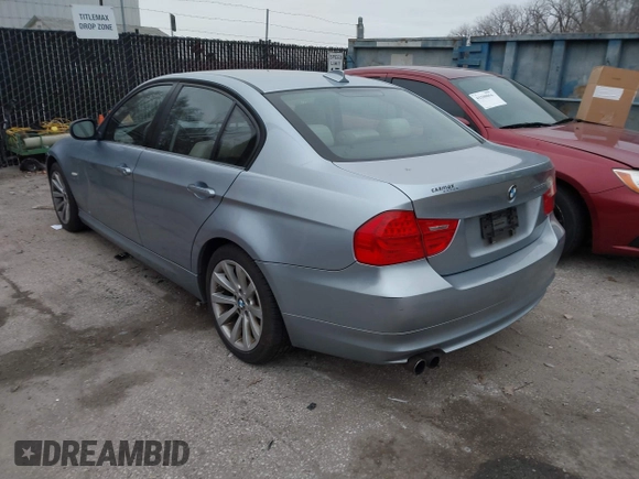 2011 BMW 3 Series 328i xDrive with VIN WBAPK7C56BA973080, listed as a IAAI auction lot 41504229 with 247,771 mi miles. Bid and sale history available at carsss.com. Image 3.