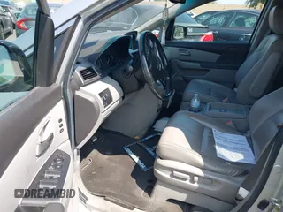 2012 Honda Odyssey Touring с VIN 5FNRL5H91CB004546, выставлен на аукционе IAAI как лот 42175002 с пробегом 118 719 миль миль и . История ставок и продаж доступна на DreamBid. Изображение 5.