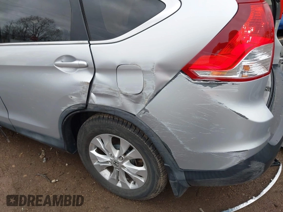 2014 Honda CR-V EX with VIN 5J6RM4H50EL065014, listed as a IAAI auction lot 41945795 with 163,677 mi miles and . Bid and sale history available at carsss.com. Image 6.