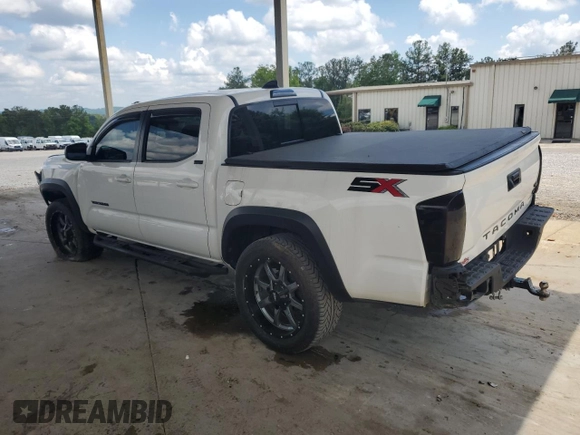2023 Toyota Tacoma SR5 z VIN 3TMAZ5CN2PM202747, wystawiony jako Copart lot #51661755 z przebiegiem 79 216 mil mil oraz Czysty tytuł • Clean title. Historia ofert i sprzedaży dostępna na DreamBid. Obrazek 2.