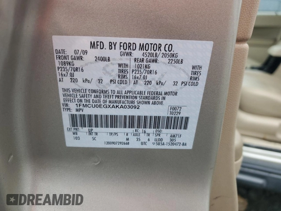 2010 Ford Escape Limited with VIN 1FMCU0EGXAKA03092, listed as a Copart auction lot 61094785 with 114,884 mi miles and Salvage title. Bid and sale history available at DreamBid. Image 13.