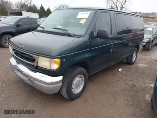 2001 Ford Econoline Wagon XL with VIN 1FMRE11LX1HB30194, listed as a IAAI auction lot 41497150 with 107,526 mi miles. Bid and sale history available at carsss.com. Image 2.