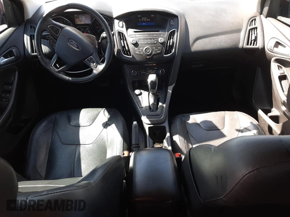 2015 Ford Focus SE z VIN 1FADP3F24FL314108, wystawiony jako Copart lot #57746805 z przebiegiem 64 659 mil mil oraz Szkoda całkowita • Salvage title. Historia ofert i sprzedaży dostępna na DreamBid. Obrazek 8.