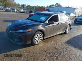2019 Toyota Camry Hybrid LE z VIN 4T1B31HK4KU516123, wystawiony jako IAAI lot #41733410 z przebiegiem 98 273 mil mil oraz . Historia ofert i sprzedaży dostępna na DreamBid. Obrazek 19.