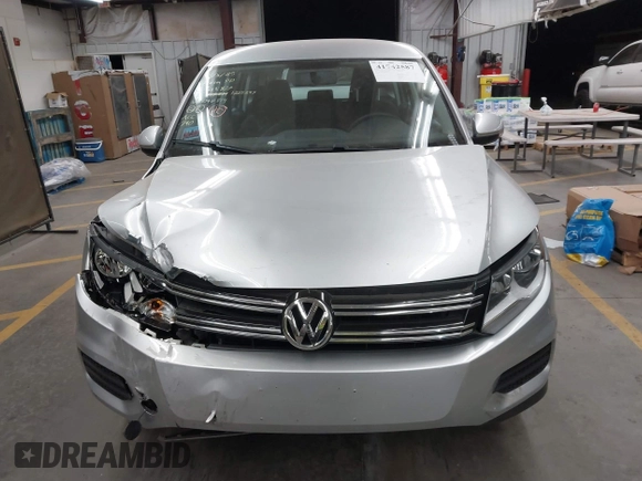 2017 Volkswagen Tiguan S with VIN WVGBV7AX6HK042814, listed as a IAAI auction lot 41742587 with 89,086 mi miles and . Bid and sale history available at DreamBid. Image 12.