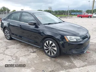 2013 Volkswagen Jetta Hybrid SE with VIN 3VW637AJ0DM281198, listed as a IAAI auction lot 42710130 with 68,068 mi miles and . Bid and sale history available at DreamBid. Image 1.