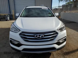 2018 Hyundai Santa Fe 2.4L с VIN 5XYZU3LB0JG555083, выставлен на аукционе Copart как лот 57936135 с пробегом 60 517 миль миль и Списание • Salvage title. История ставок и продаж доступна на DreamBid. Изображение 5.