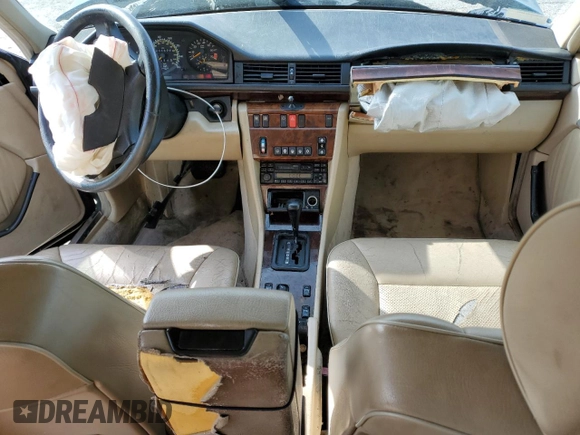 1995 Mercedes-Benz E Class with VIN WDBEA32E1SC242552, listed as a Copart auction lot 52433285 with 211,669 mi miles and Salvage Title. Bid and sale history available at carsss.com. Image 8.