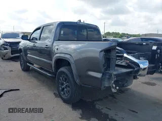 2021 Toyota Tacoma SR with VIN 3TYAX5GNXMT012484, listed as a IAAI auction lot 42429068 with 105,555 mi miles and . Bid and sale history available at DreamBid. Image 3.