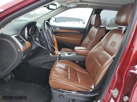 2013 Jeep Grand Cherokee Overland Summit with VIN 1C4RJFCT8DC650650, listed as a Copart auction lot 84930564 with 141,623 mi miles and Salvage Title. Bid and sale history available at carsss.com. Image 7.