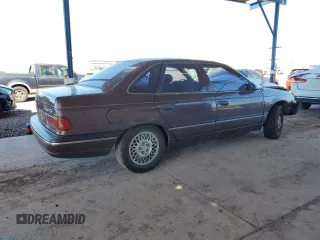 1988 Ford Taurus LX with VIN 1FABP5345JG210480, listed as a Copart auction lot 50248585 with 47,172 mi miles and Salvage Title. Bid and sale history available at carsss.com. Image 3.