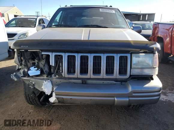 1997 Jeep Grand Cherokee Limited with VIN 1J4GZ78Y4VC568288, listed as a Copart auction lot 88265025 with 185,015 mi miles and Salvage Title. Bid and sale history available at carsss.com. Image 5.