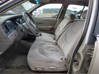 1999 Ford Crown Victoria z VIN 2FAFP73W4XX137040, wystawiony jako Copart lot #83741244 z przebiegiem 142 901 mil mil oraz Szkoda całkowita • Salvage title. Historia ofert i sprzedaży dostępna na DreamBid. Obrazek 7.
