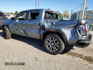 2024 GMC Canyon 4WD AT4 with VIN 1GTP6DEK8R1264699, listed as a Copart auction lot 76604464 with 2,406 mi miles and Salvage Title. Bid and sale history available at carsss.com. Image 2.