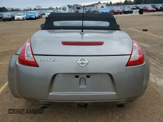 2010 Nissan 370Z z VIN JN1AZ4FH0AM301315, wystawiony jako Copart lot #86204894 z przebiegiem Nie podano mil oraz Szkody całkowita. Historia ofert i sprzedaży dostępna na DreamBid. Obrazek 6.
