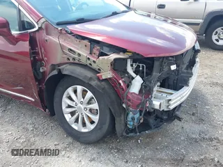 2017 Chrysler Pacifica Touring L with VIN 2C4RC1BG0HR591124, listed as a IAAI auction lot 42138595 with 113,071 mi miles and . Bid and sale history available at DreamBid. Image 19.